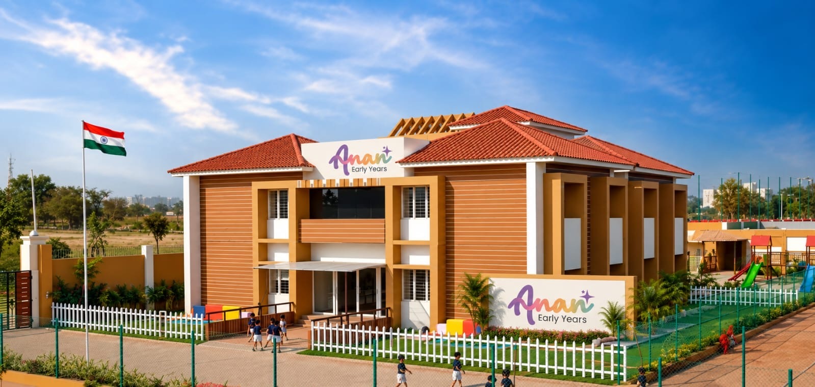 The Anan Early Years campus building with children walking to class